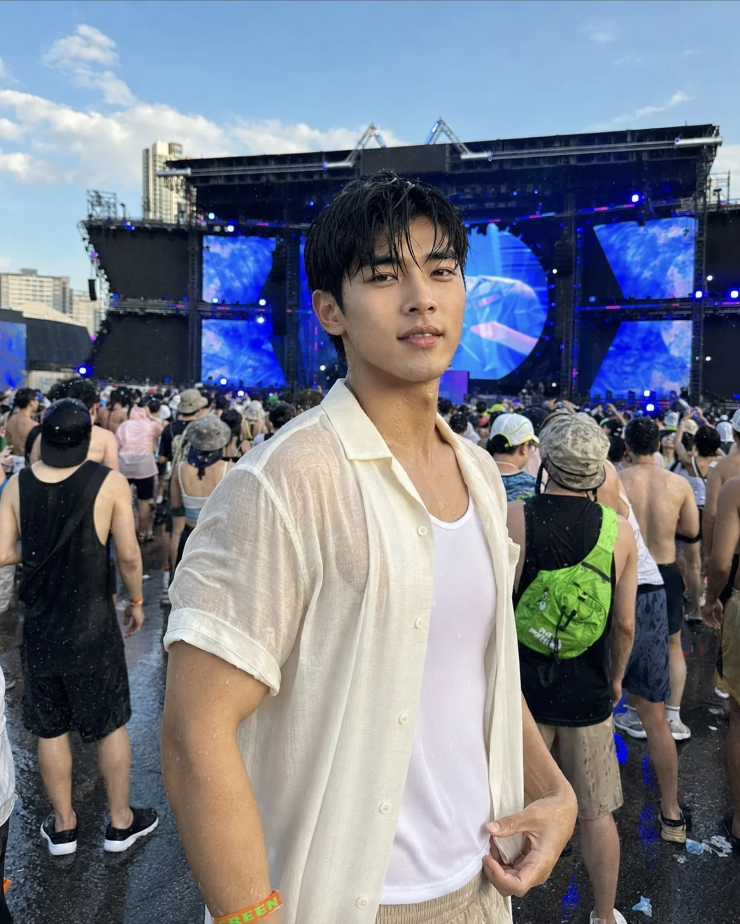 Kang Minjae against the blue festival stage at Waterbomb Seoul 2026.
